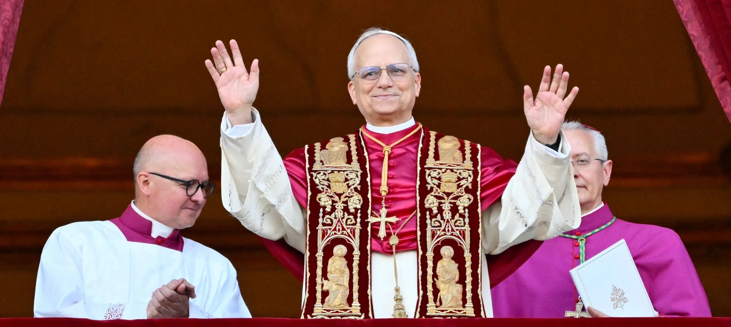 Pope Francis waves at crowd